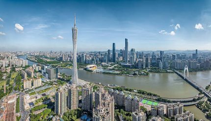 Guangzhou's modern central business district skyline presents impressive cityscape panorama during daytime in China.